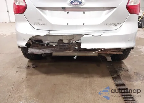 2013 Ford Focus Titanium z USA, uszkodzony, nr VIN 1FADP3N23DL284422